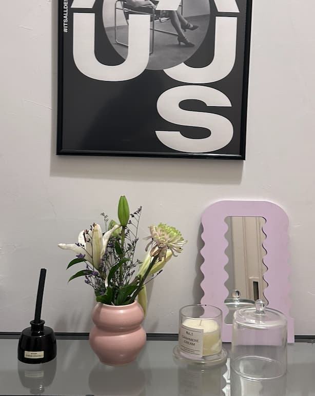 Prototype styling: vase, mirror and candle on a shelf
